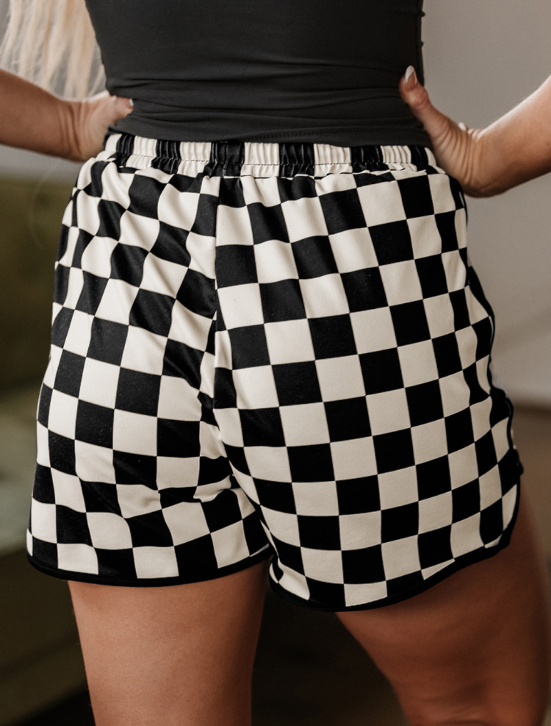 Black checkered drawstring shorts