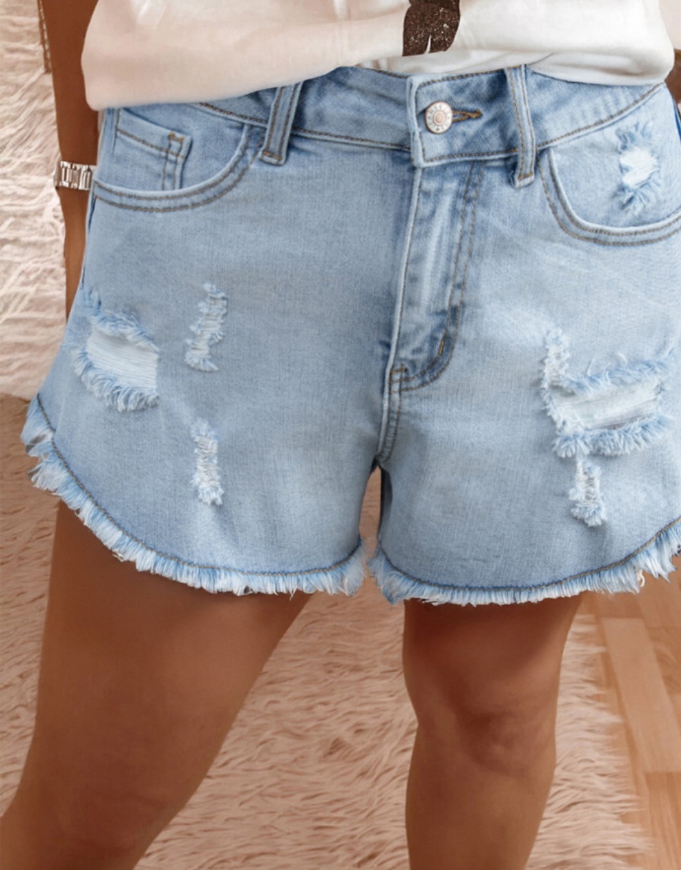 Light - blue distressed ripped raw hem high waste denim shorts